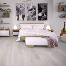 This is an example of a contemporary bedroom in london with grey walls, painted wood. Liberty Floors Premier 14mm X 190mm White Oak Brushed Matt Lacquered Engineered Real Wood Flooring Sku 195006 Leader Floors