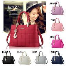 Contoh baju batik wanita kantor elegan terbaru di atas adalah baju kerja kantor kombinasi modern dengan desain tambahan pita pada bagian atasnya. Tas Import Terbaru Tas Wanita Cantik Murah Elegan Tas Kerja Wanita Lk586 Shopee Indonesia