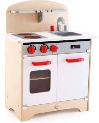 The products positively reinforce the natural tendency of kids to mimic adults. Amazon Com Hape Gourmet Kitchen Toy Fully Equipped Wooden Pretend Play Kitchen Set With Sink Stove Baking Oven Cabinet Turnable Knobs Spice Shelf Red Toys Games