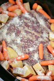 Served with carrots and potatoes for an easy meal. Slow Cooker Pot Roast The Gunny Sack