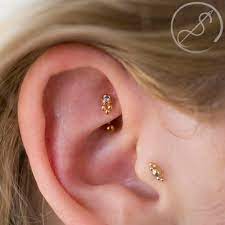 This Recent Rook Piercing By Christina Is Rocking A Rose Gold Sabrina End From Anatometal It S A Great Piece To Add Just A L Rook Piercing Piercing Anatometal