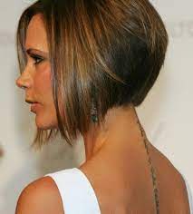 The front of the bob hairstyle shows off asymmetrical lengths and the right side is much longer then the left. Victoria Beckham Bob Haircuts I Love This But Its To Short For Me Beckham Hair Short Hair Styles Hair Styles