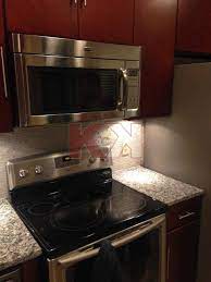 In the center, is a free standing island with cabinets underneath. Villa Cherry Kitchen Bathroom Cabinet Gallery