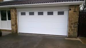 Hormann L Rib Sectional Garage Door With Glazing By Abi Hormann L Rib Insulated Sectional Garage Door With Glazing I Sectional Garage Doors Garage Doors Garage