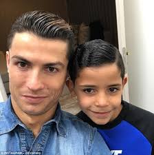 Cristiano ronaldo jr is a young football player who made his debut with juventus u9 where he scored four goals. Cristiano Ronaldo Poses For Picture With Six Year Old Son Daily Mail Online