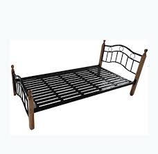 Metro series solid pine wood construction with partially engineer wood , caramel colour, drawers run on metal rails, brass coloured circular handles. Metal Frame Single Cot Bed With Wood Legs Buy Single Cot Bed Size Cheap Metal Bed Frame Fabrication Metal Frame Single Bed With Wood Legs Product On Alibaba Com