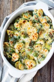 Unbelievable Cheesy Garlic Brussels Sprout Bake This Veggie Dish Tastes So Decadent But Is Under 140 Calories Sprout Recipes Veggie Dishes Recipes