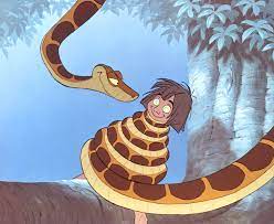 THE JUNGLE BOOK, Kaa, Mowgli, 1967, (c)Walt Disney Pictures/Courtesy:  Everett Collection << Rotten Tomatoes – Movie and TV News