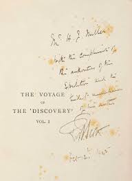 The first and second Antarctic Relief Expeditions, 1902-1904 , Captain William  Colbeck's Scrap Album including approximately 39 photographs, the majority  vintage prints, relating to the expedition, along with numerous loosely  inserted letters