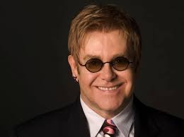 Elton John .... Feliz Cumple!!! Elton John (Pinner, Middlesex, Inglaterra;  25 de marzo de 1947), nacido como Reginald Kenneth Dwight, es un cantante,  compositor y pianista británico.4​5​6​ Con una carrera de más