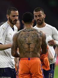 Memphis depay tattoo design on hand. Mempis Depay Back Lion Tattoo Lion Tattoo Back Tattoo Back Tattoos For Guys