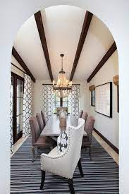What you should know before dining out in spain. Modern Spanish Dining Room With Beaded Chandelier Hgtv