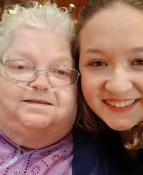 Can someone edit the oxygen cords from this photo?