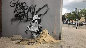 Banksy&nbsp;is a contemporary british street artist and activist who, despite his international fame, has maintained an anonymous identity. Part Of Banksy Artwork Near Lowestoft Removed Over Flood Fears Bbc News