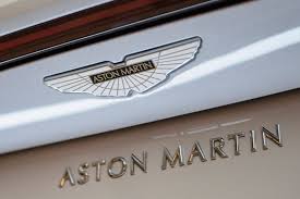 Stockbeat Aston Martins Cliff Edge Ride Set To Continue By