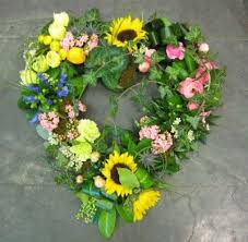Father's day is quickly approaching, which means you should probably be thinking about what you're going to get dad. Open Garden Heart Flower Arrangements Funeral Heart Funeral Floral