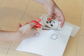 Fold your paper to create a triangle. Cubetto Crafts Make A Dog Mask Primo Toys