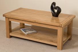 This coffee table leans into its coastal farmhouse look with natural wood finishes and a mixed material design. Cottage Solid Oak Coffee Table Modern Furniture Direct