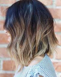 Fun and subtle beach waves with natural highlights. 50 Best And Flattering Brown Hair With Blonde Highlights For 2020