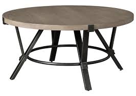 Discover extraordinary fine art, craft, and design for your home and wardrobe. Zontini Round Cocktail Table Ashley Homestore Canada