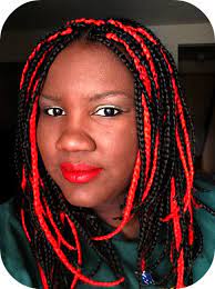 This braided look combines thing braids with thick braids and it's all pulled together into a tight bun. Red Box Braids On Black Hair Novocom Top
