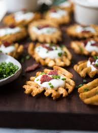 Waffle fries may be grouped in with traditional french fries, but they couldn't be more different. Waffle Fry Baked Potato Bites