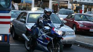 Lane splitting, lane sharing, lane filtering, shoulder surfing. Lane Splitting In California Finally Legal But Can T Happen Yet