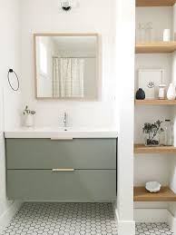 Idee Decoration Salle De Bain The Guest Bathroom Utilizes A Simple Ikea Vanity Custom Painted To The Perfect S Idee Salle De Bain Decoration Salle De Bain Idees Salle De Bain
