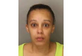 Woman arrested after letting child drive car