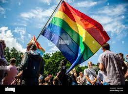 A protester holds a rainbow flag during the demonstration.The annual equal  rights demonstration for the global rainbow community took place in  Amsterdam. Due to the COVID-19 measures, the demonstration didn't start at