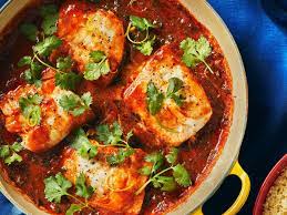 Braised Fish With Spicy Tomato Sauce Recipe Recipe Spicy Tomato Sauce Tomato Sauce Recipe Recipes