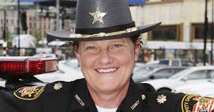 She says the sheriff fired her for being gay. Now, she'll be the sheriff.