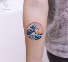The waves are encircled by a switch triangle shape. Japanese Wave Tattoo Small Novocom Top