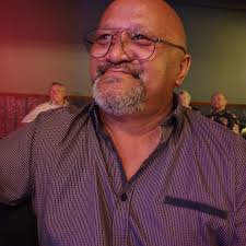 Why do passengers with mobility issues sit in the back?