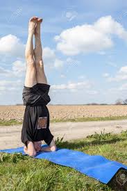 Maybe you would like to learn more about one of these? On An Sunny Day This Man Enjoys Mukta Hasta Sirsasana Yoga In Stock Photo Picture And Royalty Free Image Image 58535305