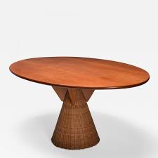 The pedestal collection, including the saarinen dining table, was the result of eero saarinen addressing the unrestful world underneath chairs and tables. Bonacina Italian Design Oval Mid Century Modern Dining Table On A Rattan Base 1970 S
