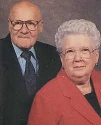 Dr. and Mrs. Absher, 1956, with our daughter.