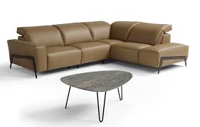 Power reclining sofa, power reclining loveseat and wedge. Ocean Miele Motion Sectional Light Brown By J M Furniture