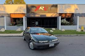 Image result for Brilliant Red 1993 Saturn