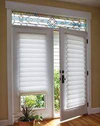Drapes or curtain panels are a simple, affordable window treatment for sliding glass doors. French Doors Covering Tierd Shades Patio Door Coverings French Door Window Treatments Door Coverings