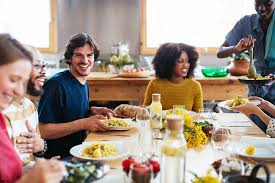 List all of the foods you plan to serve on a sheet and ask guests to write down their predictions for the food. Friends Having Fun At A Dinner Party By Bonninstudio Dinner Happy Dinner Party Dinner Dinner At Home
