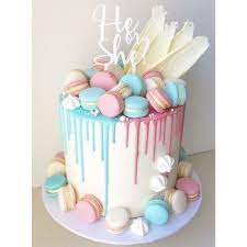 Blue And Pink Gender Reveal Cake With Macarons On Carousell Cake Baby Shower Cakes Baby Shower