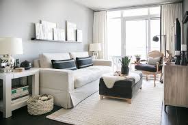 You can perhaps add two to three extra chairs to. A Toronto Condo Packed With Stylish Small Space Solutions Condo Living Room Small Living Room Decor Small Apartment Living Room