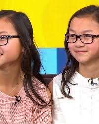 Twin sisters, separated at birth and reunited