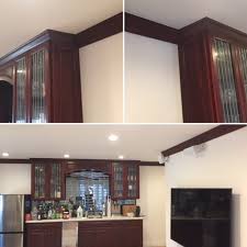 Homeowners can opt to bleach or stain their dark wood kitchen cabinets in order to lighten them up. Easy Diy Crown Moulding To Match Stained Wood Cabinets Trim Etc