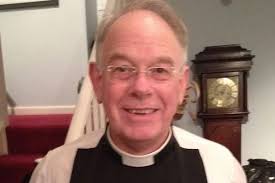 Church of England clergyman banned from taking services because he married  gay partner