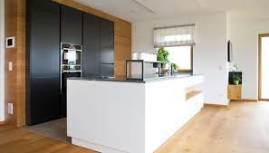 bam wohnen gmbh ewe50 weiss holzeiche natur stein atlantis seitenansicht haus kuchen moderne kuche kuche industrial