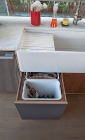 Two large trash cans hidden in one of the. Custom Under Sink Garbage Bin Push Latch Drawer Made Of Walnut Veneer Europly Cabinetry By Kerf Design Modern Kitchen Cabinets Kitchen Remodel Plywood Kitchen