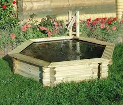 27 idees pour le bassin de jardin preforme hors sol archzine fr bassin de jardin bassin de jardin preforme petit bassin de jardin