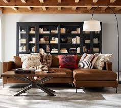 Relaxing masculine living room design ideas to try 50 one common complaint amongst men is the breakability of most furniture, thus our room comes stocked with one large industrial steel table. Get The Look Moody Masculine Living Room